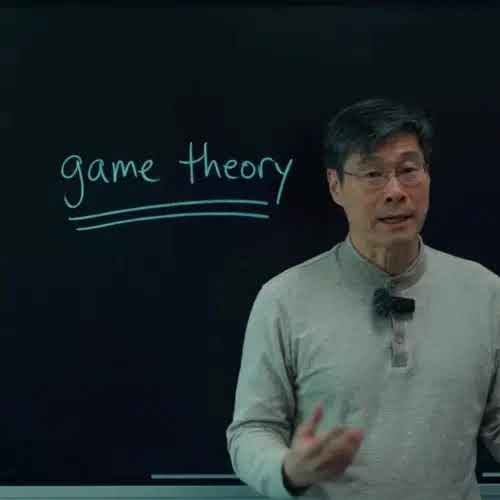 Professor Jiang Xueqin at a blackboard
